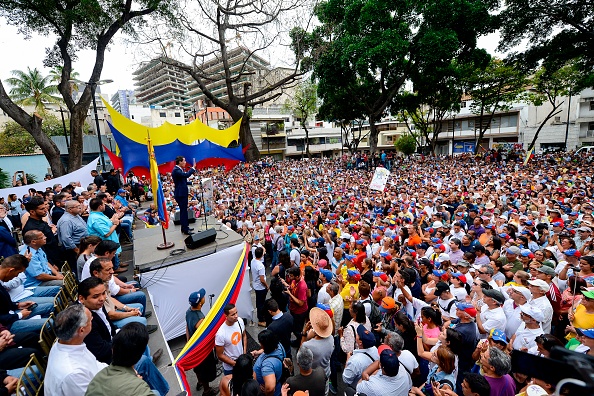 Supporters of Venezuelan opposition leader and self-proclaimed interim president Juan Guaido take part in a meeting at Chacao neighbourhood in Caracas on April 19, 2019